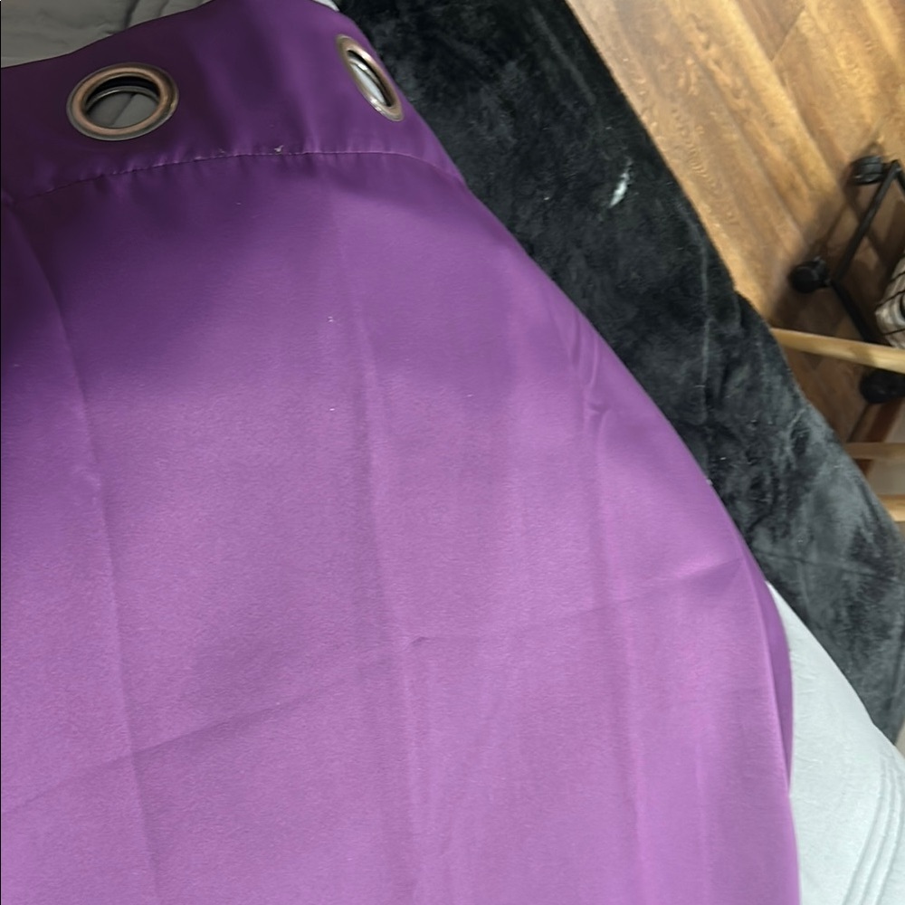1 pair of purple curtains